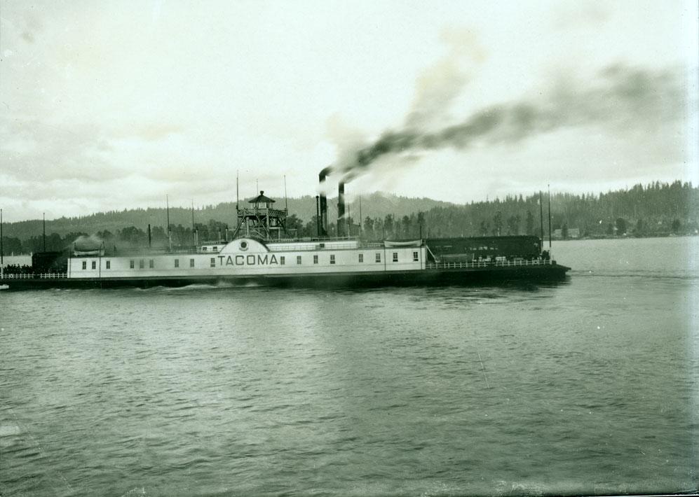 Side view of &quot;Tacoma,&quot; a Northern-Pacific-owned ferry loaded with passengers and a train (ca. 1900, photo used with permission from Washington State Historical Society).